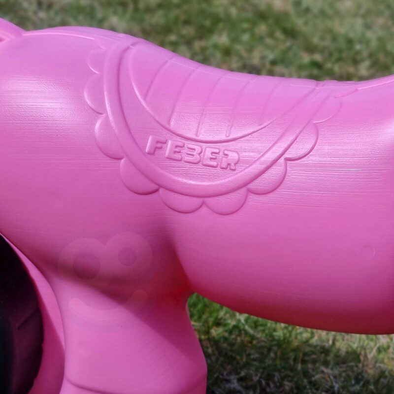 Jeździk biegowy różowy jednorożec na szerokich kołach, zabawka dla dzieci, Feber